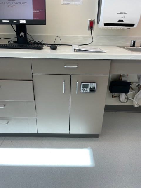CompX eLock 300 series cabinet version installed on a cabinet in a hospital